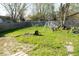 Backyard featuring a wood fence and swing set at 7838 Burr Oak Ct, Indianapolis, IN 46217