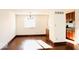 Bright room featuring hardwood floors and natural light at 7838 Burr Oak Ct, Indianapolis, IN 46217