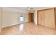 Spacious bedroom with a ceiling fan, wood floors, closet, and a window that offer ample natural light and ventilation at 831 N 12Th St, Elwood, IN 46036