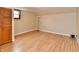 Cozy room with wood floors, a small window and a spacious closet with sliding doors and neutral paint that offer a soothing ambiance at 831 N 12Th St, Elwood, IN 46036
