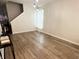 Bright, open dining room with hardwood floors, modern lighting, and ample space for entertaining at 8333 Sansa St, Indianapolis, IN 46113