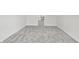 Large attic space with neutral carpeting; an unfinished storage or bonus room at 835 N Dearborn St, Indianapolis, IN 46201