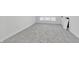 Attic featuring neutral carpeting and bright natural light at 835 N Dearborn St, Indianapolis, IN 46201