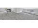 Large attic or bonus room with gray carpet and a window at 835 N Dearborn St, Indianapolis, IN 46201