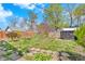 Spacious backyard oasis with mature trees and plenty of room for outdoor enjoyment at 835 N Dearborn St, Indianapolis, IN 46201