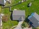 Aerial view showcasing a home's backyard and fence, providing privacy and outdoor space at 84 Beech Ct, Whiteland, IN 46184