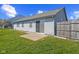 Backyard featuring a well-kept lawn and a back patio at 84 Beech Ct, Whiteland, IN 46184