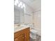 Bathroom with a vanity with cabinets and a sink with marble countertop at 84 Beech Ct, Whiteland, IN 46184