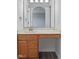 Bathroom with a vanity with cabinets and a sink with marble countertop at 84 Beech Ct, Whiteland, IN 46184