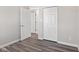 Bedroom featuring new vinyl floors, a closet and fresh paint at 84 Beech Ct, Whiteland, IN 46184