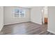 Cozy bedroom with a large window and an adjacent bathroom at 84 Beech Ct, Whiteland, IN 46184