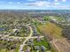 Aerial view of the residential neighborhood, revealing a vast network of homes and community at 84 Beech Ct, Whiteland, IN 46184
