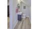 Compact bathroom with modern vanity, sleek fixtures, and space-saving design at 8740 Morgan Dr, Fishers, IN 46038