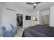 Bedroom with walk-in closet and en suite bathroom, all featuring modern finishes at 8740 Morgan Dr, Fishers, IN 46038