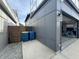 The home features a modern gray exterior and an attached garage with parking at 8740 Morgan Dr, Fishers, IN 46038