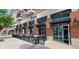 Street view of the Senanos Fresh Mexican Food restaurant with umbrella covered outdoor seating at 8740 Morgan Dr, Fishers, IN 46038
