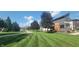 A well-maintained lawn and modern home exterior create an inviting curb appeal at 8740 Morgan Dr, Fishers, IN 46038