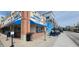Exterior of Handel's Homemade Ice Cream featuring a blue and white color scheme with an inviting entrance and street view at 8740 Morgan Dr, Fishers, IN 46038