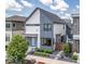Stylish two-story home with a gray and white exterior, modern landscaping, and a welcoming entry at 8740 Morgan Dr, Fishers, IN 46038