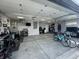 Spacious garage with ample storage, workspace, and room for multiple vehicles, offering organization and functionality at 8740 Morgan Dr, Fishers, IN 46038