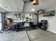 Spacious garage setup includes a work area, tool storage, and room for parking at 8740 Morgan Dr, Fishers, IN 46038