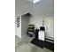 The garage includes storage shelves and a wash sink at 8740 Morgan Dr, Fishers, IN 46038