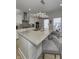 Stylish kitchen island with modern pendant lighting and seating at 8740 Morgan Dr, Fishers, IN 46038