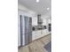 Kitchen with stainless steel appliances, a gas range, and modern cabinetry at 8740 Morgan Dr, Fishers, IN 46038