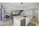 Spacious kitchen with an island, and open floor plan, seamlessly connecting to the living areas at 8740 Morgan Dr, Fishers, IN 46038