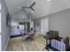 Open living area with vaulted ceilings, modern finishes and dining area with mini-kitchen at 8740 Morgan Dr, Fishers, IN 46038