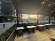 The restaurant patio offers comfortable outdoor seating with a scenic view at sunset at 8740 Morgan Dr, Fishers, IN 46038