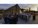 Roof deck with comfortable seating, dining area, and views overlooking the building and surrounding area at 8740 Morgan Dr, Fishers, IN 46038