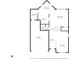 First floor plan featuring the living room, dining area, kitchen, garage and laundry at 8813 Browns Valley Ln, Indianapolis, IN 46113