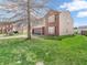 Two-story home with attached garage and a well-maintained lawn at 8813 Browns Valley Ln, Indianapolis, IN 46113