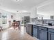 Spacious kitchen with stainless steel appliances and an adjacent dining area at 8813 Browns Valley Ln, Indianapolis, IN 46113