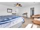 Bright main bedroom with a cozy seating area, providing a comfortable and stylish space at 8813 Browns Valley Ln, Indianapolis, IN 46113