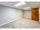 Finished basement featuring neutral carpet, gray walls, and recessed lighting at 9362 Helmsdale Dr, Indianapolis, IN 46256