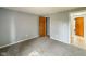 Bedroom featuring neutral carpet and gray walls at 9362 Helmsdale Dr, Indianapolis, IN 46256