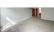 Carpeted bedroom features two closets and neutral paint at 9362 Helmsdale Dr, Indianapolis, IN 46256