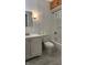 Cozy bathroom features a shower-tub combo and a classic vanity with a mirrored light fixture at 9882 Woodbriar Ln, Carmel, IN 46280