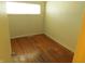 Empty bedroom featuring hardwood floors, a window providing natural light, and neutral walls at 99 Armitage St, Cicero, IN 46034