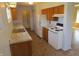 Functional kitchen features ample counter space, essential appliances, and efficient layout at 99 Armitage St, Cicero, IN 46034