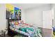 Vibrant bedroom with superhero theme, colorful decor, and ample space for play and relaxation at 1015 Villa Ave, Indianapolis, IN 46203