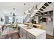A modern kitchen featuring sleek cabinets, stainless steel appliances, and a center island at 1015 Villa Ave, Indianapolis, IN 46203