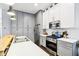 Well-lit kitchen with stainless steel appliances and ample counter space at 1015 Villa Ave, Indianapolis, IN 46203