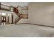Spacious entryway featuring a grand staircase and hardwood floors at 10814 Tallow Wood Ln, Indianapolis, IN 46236