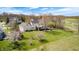 Expansive backyard view showcasing lush landscaping and a manicured lawn at 10846 Hamilton Pass, Fishers, IN 46037