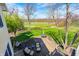 Aerial shot of home's lush backyard, patio and outdoor seating area at 10846 Hamilton Pass, Fishers, IN 46037