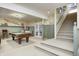 Finished basement featuring a pool table and carpeted staircase at 10846 Hamilton Pass, Fishers, IN 46037