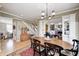 Elegant dining room featuring a view to the staircase and living room at 10846 Hamilton Pass, Fishers, IN 46037